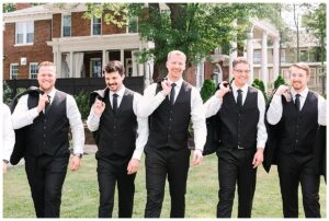 Groomsmen walking confidently at Separk Mansion.