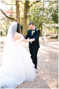 The bride and groom share a heartfelt first look at Vanlandingham Estate, Charlotte, NC.