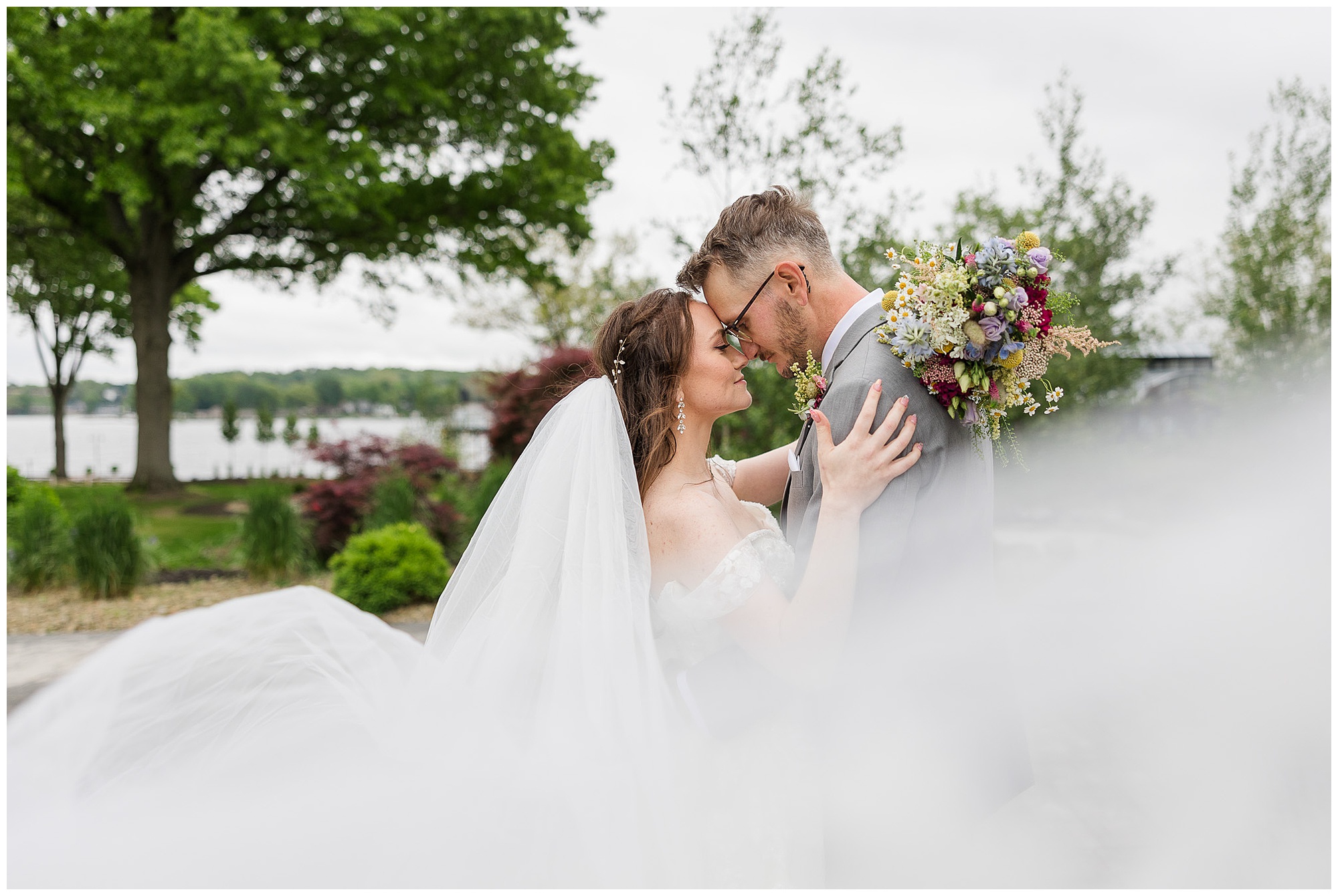 bride and groom portraits at Tudor House Mason's Cove New Franklin Ohio wedding