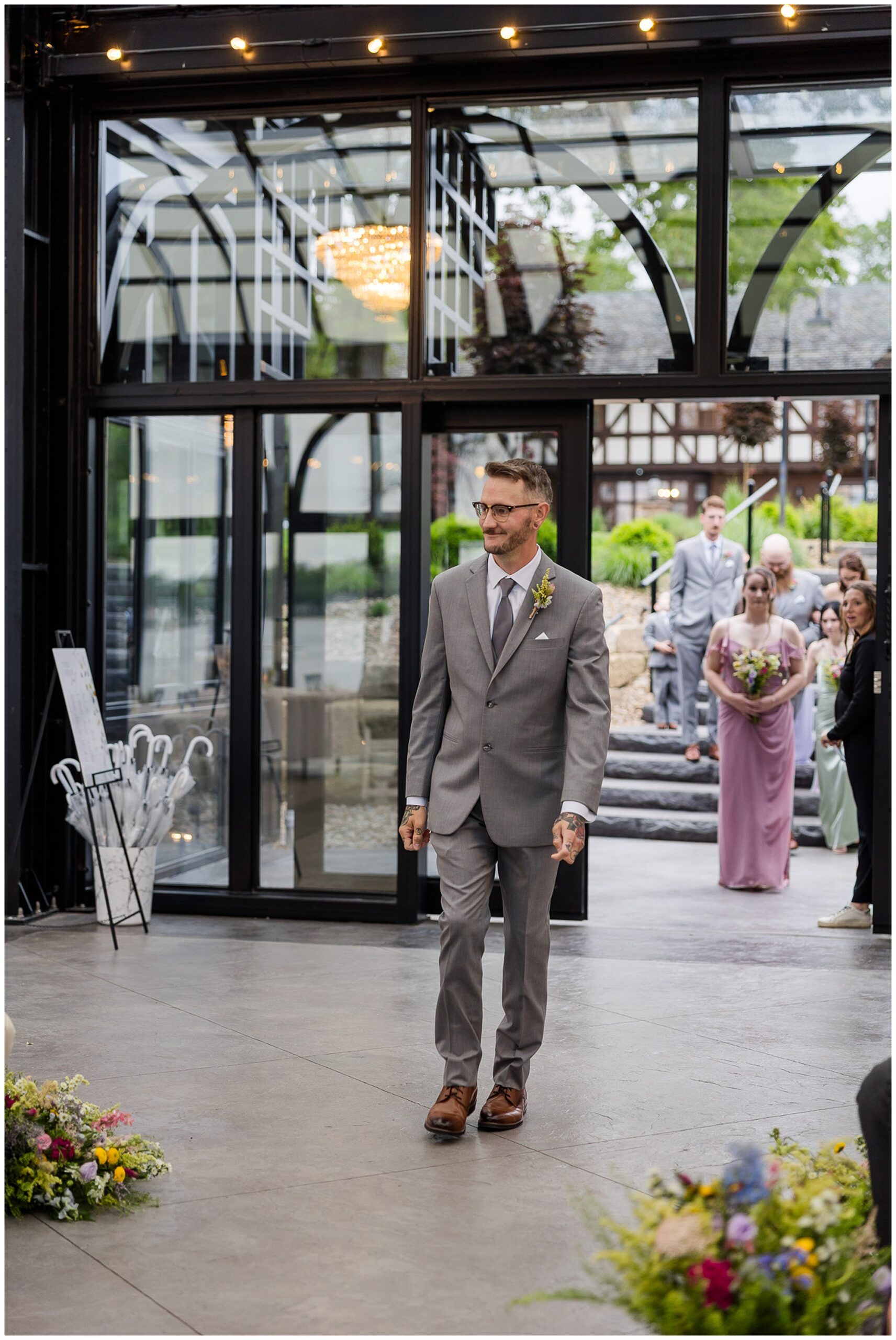 groom walking down aisle Tudor House at Mason's Cove wedding New Franklin Ohio