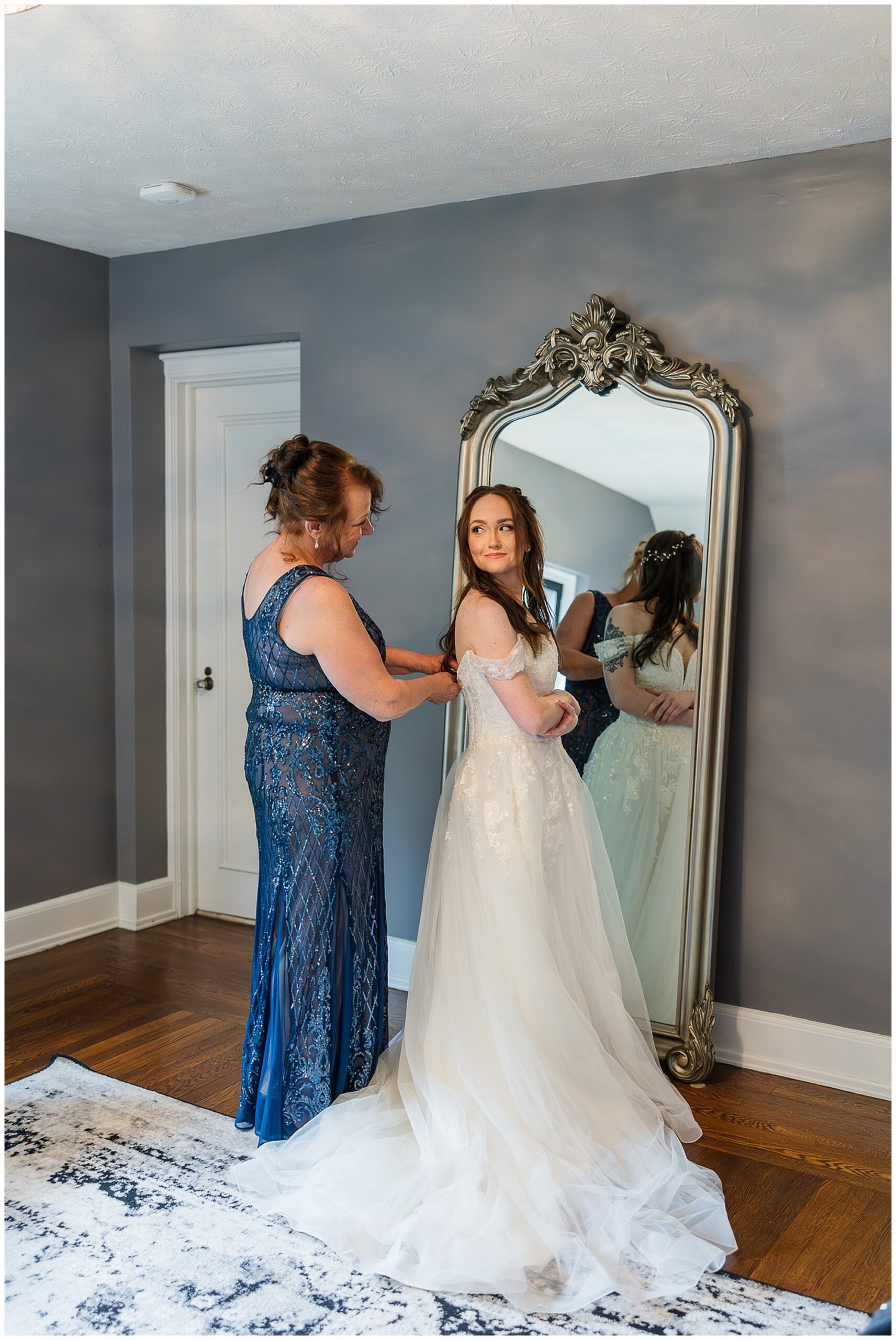 mother helping bride get ready Tudor House at Mason's Cove Ohio wedding