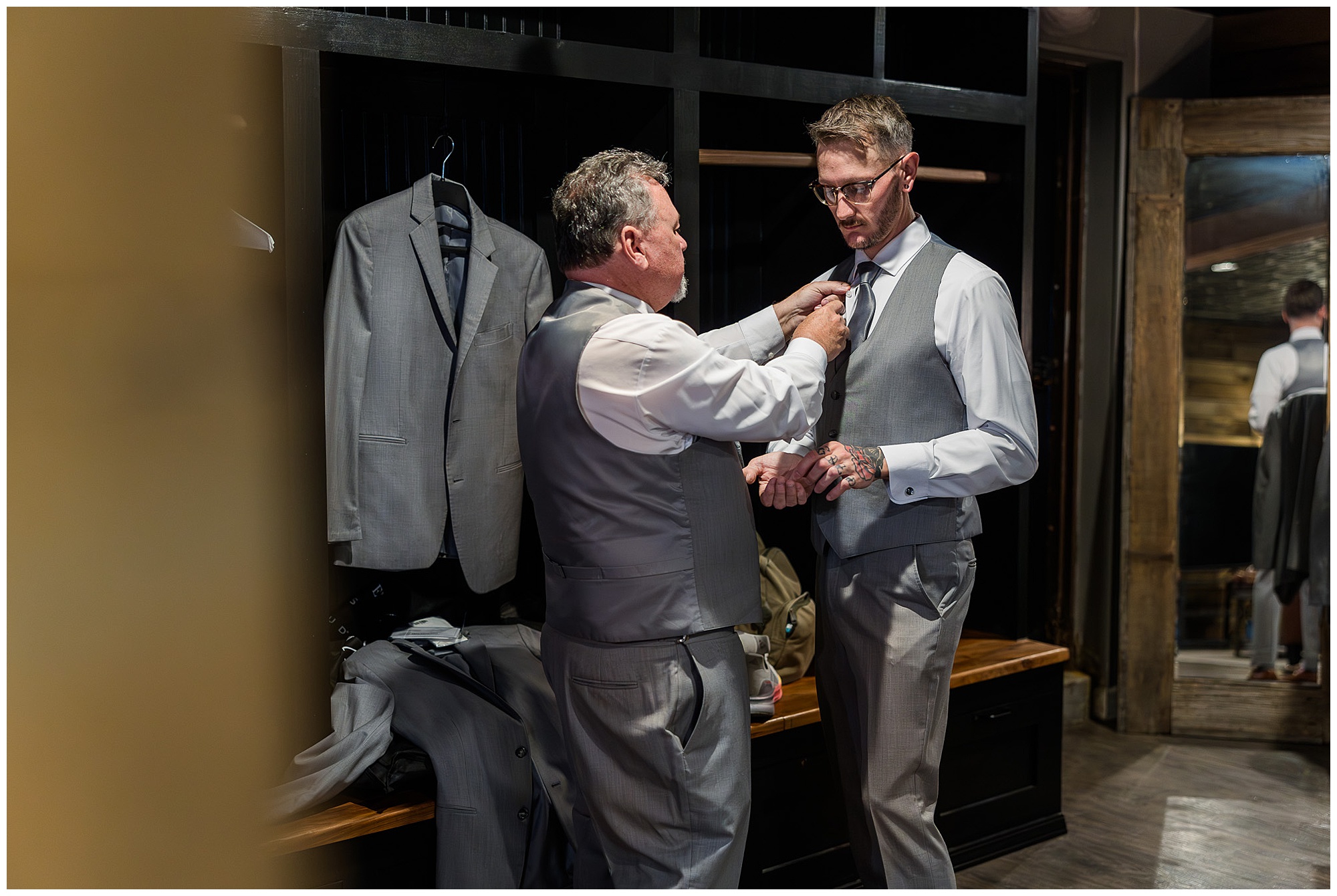 father helping groom get ready Mason's Cove wedding New Franklin Ohio