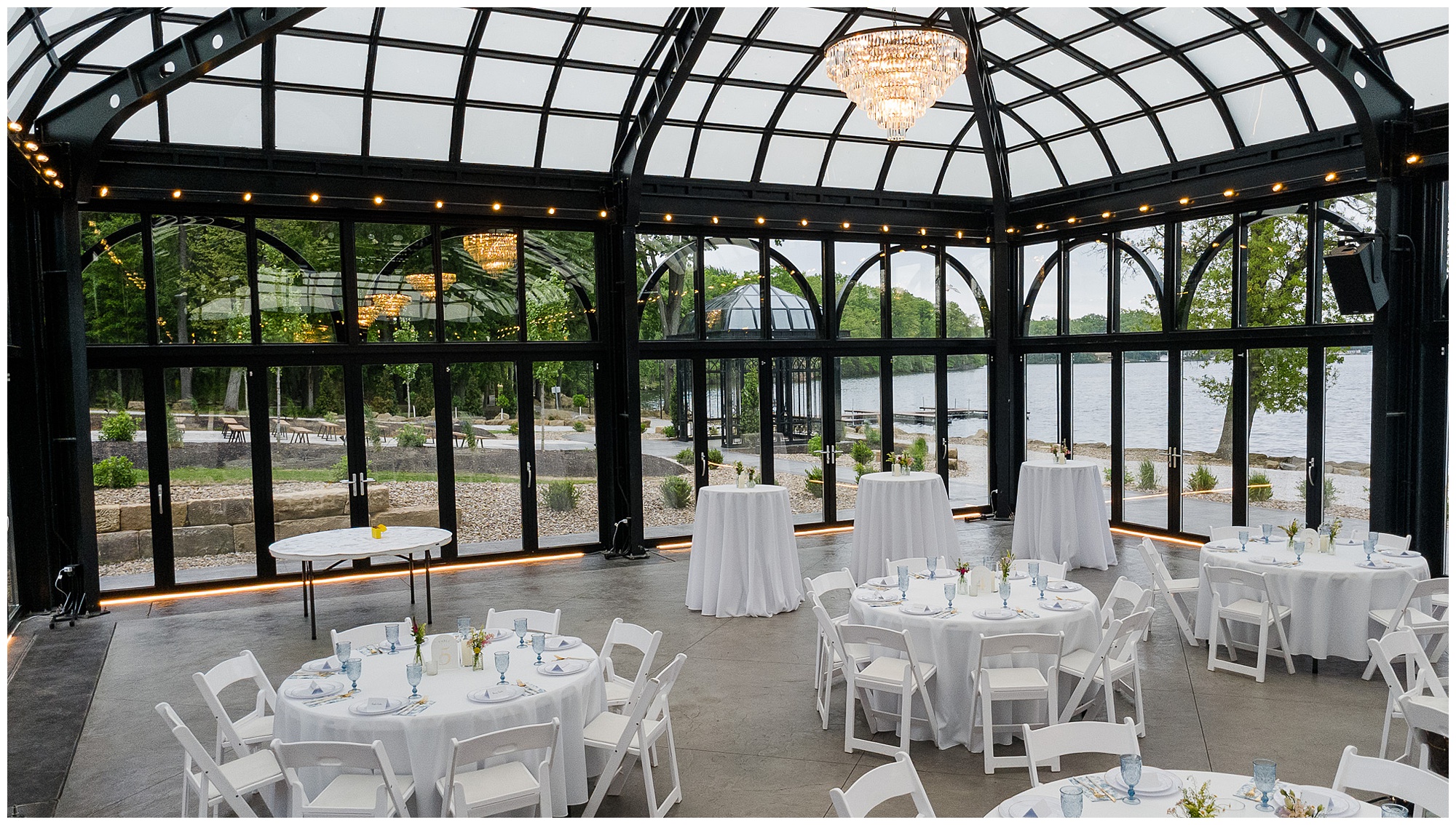 Tudor House Mason's Cove conservatory interior wedding reception chandelier table settings Ohio